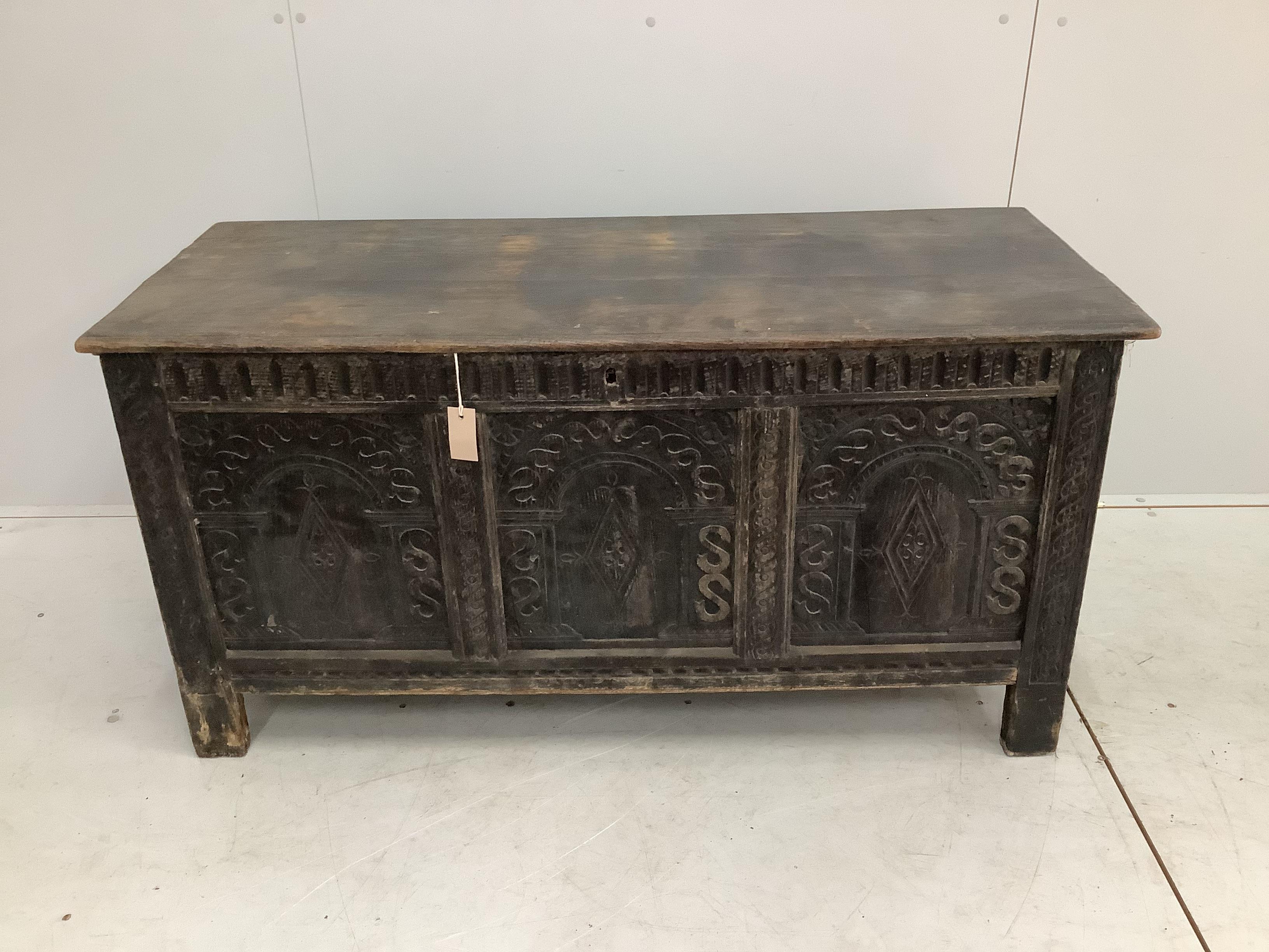 A 17th century style oak coffer, width 127cm, depth 53cm, height 64cm